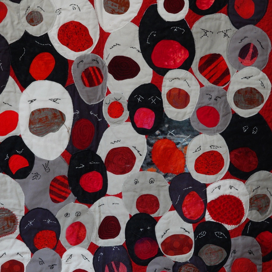 Close up of abstracted faces with screaming, open mouths